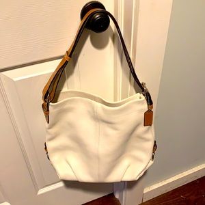 Cream color Coach pocketbook